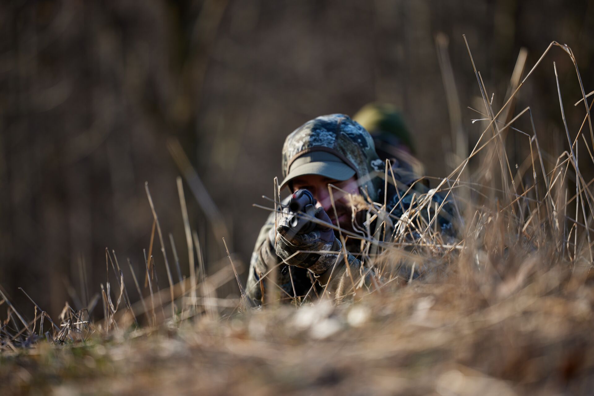 A hunter aims a firearm, what is sight alignment concept. 