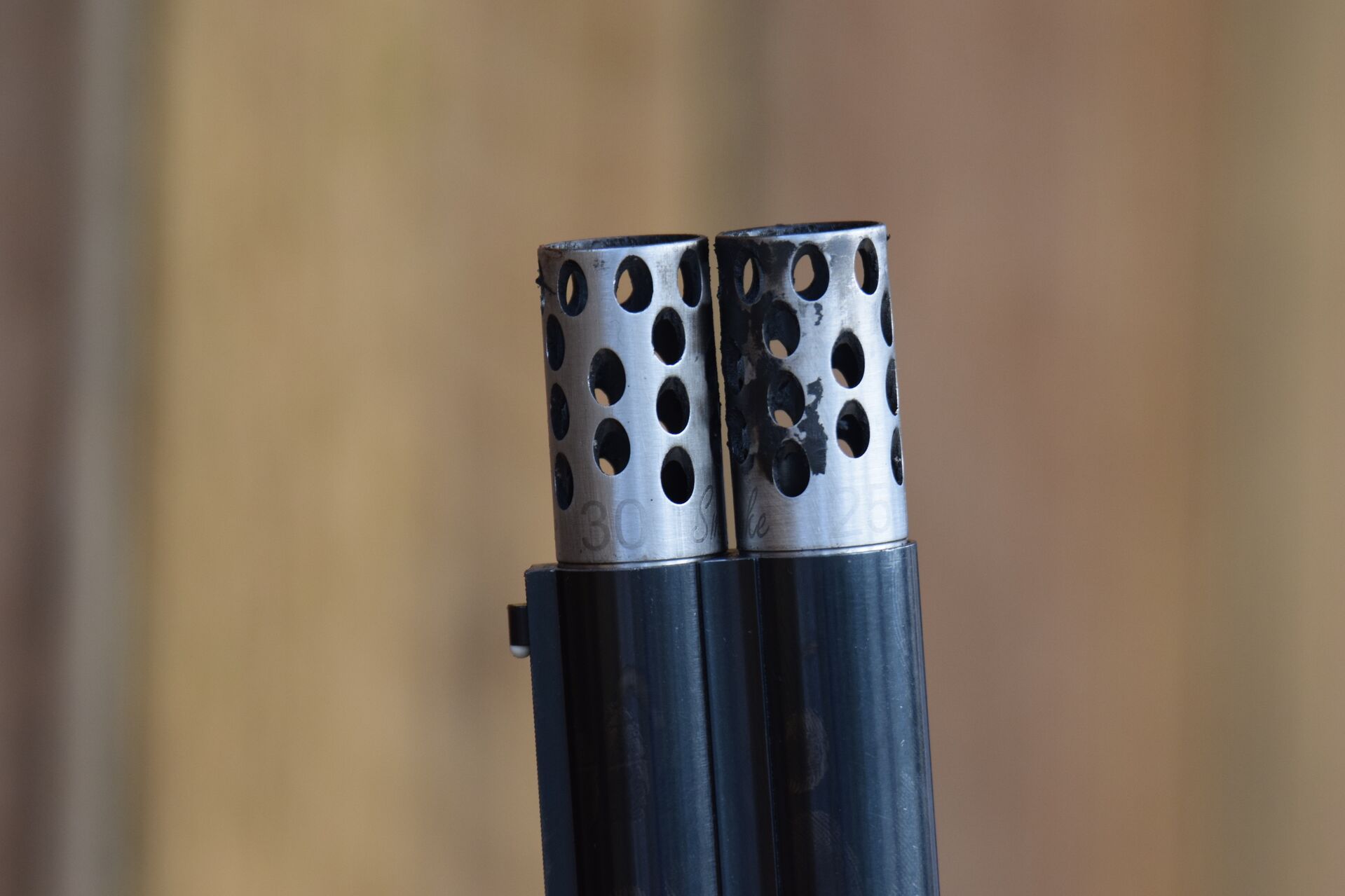 A shotgun barrel with a choke. 